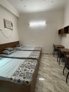 Bedroom Image of Vizima Boys PG in Sector 128, Noida