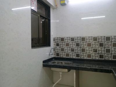Kitchen Image of 850 Sq.ft 2 BHK Apartment / Flat for rent in Runwal Gardens City Cluster 6 Tower 6 To 9, Dombivli East Thane for Rs. 15000