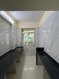Kitchen Image of 960 Sq.ft 2 BHK Apartment / Flat for sale in Mohan Willows III, Badlapur East Badlapur for Rs. 3955000