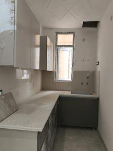 Kitchen Image of 1500 Sq.ft 3 BHK Apartment / Flat for sale in Ambesten Twin Chalet, Noida Extension Greater Noida for Rs. 5900000