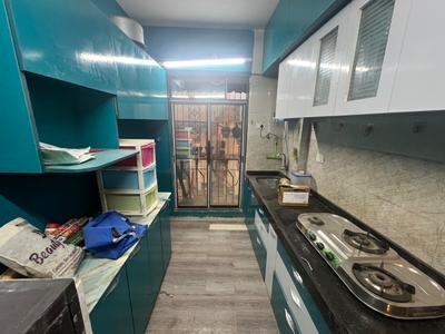 Kitchen Image of 672 Sq.ft 2 BHK Apartment / Flat for rent in Riddhi Siddhi Exotica, Taloja Navi Mumbai for Rs. 18000