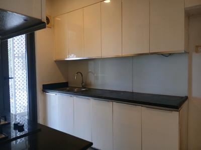 Kitchen Image of 850 Sq.ft 2 BHK Apartment / Flat for sale in Nityanand Baug CHS, Chembur Mumbai for Rs. 18000000