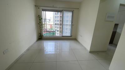 Living Room Image of 550 Sq.ft 1 BHK Apartment / Flat for sale in Godrej Nest, Kandivali East Mumbai for Rs. 12000000