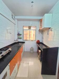 Kitchen Image of 630 Sq.ft 1 BHK Apartment / Flat for rent in Rajhans Kshitij Iris Wing E F G, Vasai West Vasai for Rs. 20000