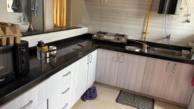 Kitchen Image of 1215 Sq.ft 2 BHK Apartment / Flat for rent in Samved Alpine Heights, Navrangpura Ahmedabad for Rs. 32000