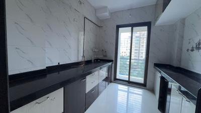 Kitchen Image of 1050 Sq.ft 2 BHK Apartment / Flat for rent in Sai Karishma Sundaram, Mira Road East Mira Bhayandar for Rs. 30000