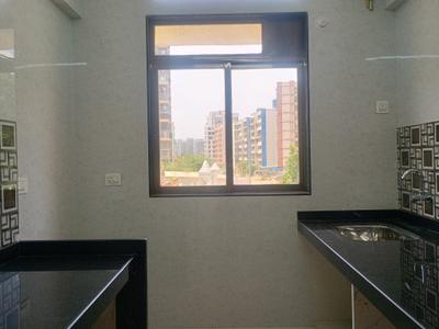 Kitchen Image of 697 Sq.ft 1 BHK Apartment / Flat for sale in Palm Vista A1 &amp; A2, Shilphata Thane for Rs. 5499000