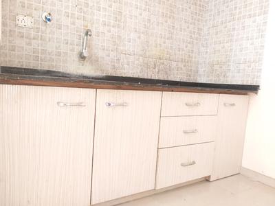 Kitchen Image of 900 Sq.ft 1 BHK Apartment / Flat for rent in Satellite Ahmedabad for Rs. 15000