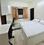 Bedroom Image of Boyz PG in Kotla Mubarakpur, New Delhi