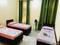 Bedroom Image of Raksha Hostel in Knowledge Park 3, Greater Noida
