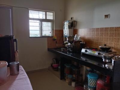Kitchen Image of 600 Sq.ft 1 BHK Apartment / Flat for sale in Maple Aapla Ghar Kirkatwadi, Kirkatwadi Pune for Rs. 3200000