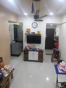 Living Room Image of 675 Sq.ft 1 BHK Apartment / Flat for sale in SP Krishna Aangan Complex, Vasan Nagar Navi Mumbai for Rs. 4500000