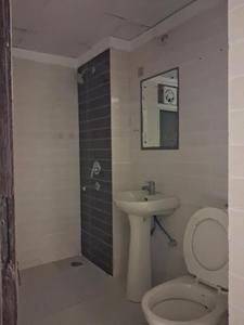 Common Bathroom Image of 945 Sq.ft 2 BHK Apartment / Flat for sale in Amrapali Zodiac, Sector 120 Noida for Rs. 9000000