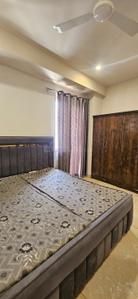 Bedroom Image of 1200 Sq.ft 1 BHK Builder Floor for rent in Sector 17 Gurgaon for Rs. 34000