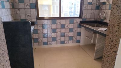 Kitchen Image of 980 Sq.ft 2 BHK Apartment / Flat for rent in Paradise Sai Icon, Kharghar Navi Mumbai for Rs. 35999