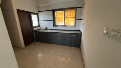 Kitchen Image of 1925 Sq.ft 3 BHK Apartment / Flat for sale in Dwarkesh Opulence, Tragad Ahmedabad for Rs. 9500000