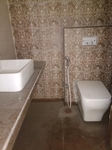 Common Bathroom Image of 715 Sq.ft 1 BHK Apartment / Flat for sale in Metro Satyam Queens Necklace, Taloja Navi Mumbai for Rs. 4200000