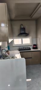 Kitchen Image of 1050 Sq.ft 2 BHK Apartment / Flat for rent in Parth Avenue, Siroli Jaipur for Rs. 25000