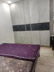 Bedroom Image of 900 Sq.ft 2 BHK Builder Floor for rent in Ramesh Nagar New Delhi for Rs. 30000