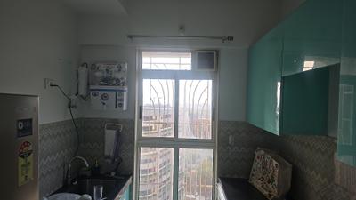 Kitchen Image of 700 Sq.ft 1 BHK Apartment / Flat for rent in Lodha Upper Thane Sereno, Bhiwandi Thane for Rs. 18499