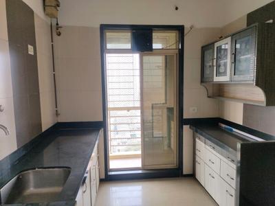 Kitchen Image of 1000 Sq.ft 2 BHK Apartment / Flat for rent in Retro Avenue, Kopar Khairane Navi Mumbai for Rs. 46000