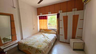 Bedroom Image of 950 Sq.ft 2 BHK Apartment / Flat for rent in Nirman Nadbramha Society, Warje Pune for Rs. 26000
