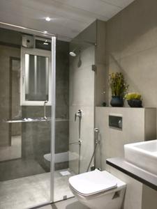 Common Bathroom Image of 4200 Sq.ft 4 BHK Apartment / Flat for sale in Kolte Patil 24K Sereno, Baner Pune for Rs. 32000000