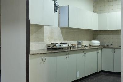 Kitchen Image of DHANKUS GIRLS PG  in Sector 16A, Noida
