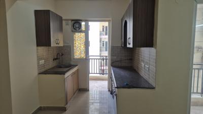 Kitchen Image of 890 Sq.ft 2 BHK Apartment / Flat for rent in Sethi Max Royal, Sector 76 Noida for Rs. 26000