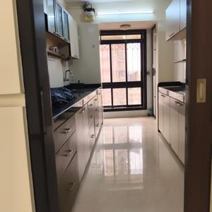 Kitchen Image of 750 Sq.ft 2 BHK Apartment / Flat for rent in Dheeraj Ganga Apartments, Malad West Mumbai for Rs. 60000