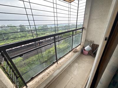 Balcony Image of 910 Sq.ft 2 BHK Apartment / Flat for sale in Happy Sarvodaya Trilok, Thakurli Thane for Rs. 7500000