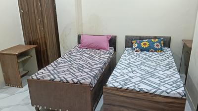 Bedroom Image of RV PG in Sector 18, Noida
