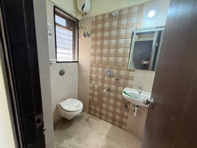 Bathroom Image of 550 Sq.ft 1 BHK Apartment / Flat for rent in Raunak Unnathi Woods, Kasarvadavali Thane for Rs. 20000