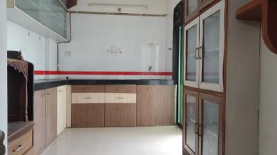 Kitchen Image of 980 Sq.ft 2 BHK Apartment / Flat for rent in Pooja White Flag, Kamothe Navi Mumbai for Rs. 30000