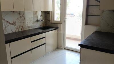 Kitchen Image of 1400 Sq.ft 3 BHK Apartment / Flat for sale in Heerawala Jaipur for Rs. 6500000