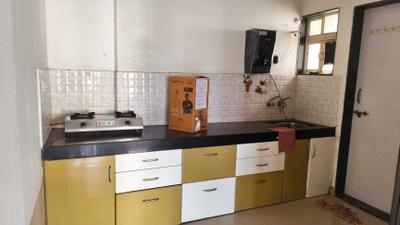 Kitchen Image of 680 Sq.ft 2 BHK Apartment / Flat for rent in Raj Heramba Venkatesh Imperia, Punawale Pune for Rs. 26000