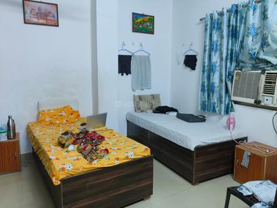 Bedroom Image of Shristhi PG in Sector 52, Noida