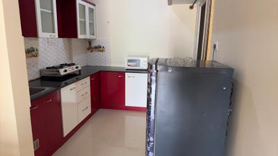 Kitchen Image of 1100 Sq.ft 2 BHK Apartment / Flat for rent in Neeladri Paradise, Mahadevapura Bengaluru for Rs. 41999