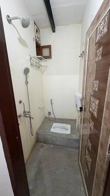 Bathroom Image of 150 Sq.ft 1 RK Independent House for rent in Rajpur Khurd Village New Delhi for Rs. 5000