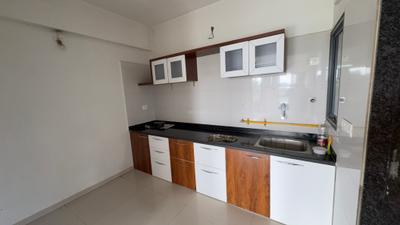 Kitchen Image of 1120 Sq.ft 2 BHK Apartment / Flat for rent in Sahjanand Shilp, Vavol Gandhinagar for Rs. 16000