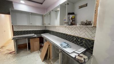Kitchen Image of 1040 Sq.ft 3 BHK Apartment / Flat for sale in Sector 5 Rohini New Delhi for Rs. 6700000