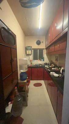 Kitchen Image of 1025 Sq.ft 2 BHK Apartment / Flat for sale in Brijdham Complex, Lake Town Kolkata for Rs. 5500000