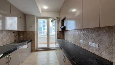Kitchen Image of 3000 Sq.ft 4.5 BHK Builder Floor for rent in Unitech Woodstock Floors, Sector 50 Gurgaon for Rs. 90000
