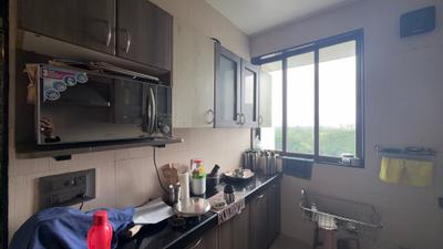Kitchen Image of 1715 Sq.ft 3 BHK Apartment / Flat for rent in Kesar Harmony, Kharghar Navi Mumbai for Rs. 100000