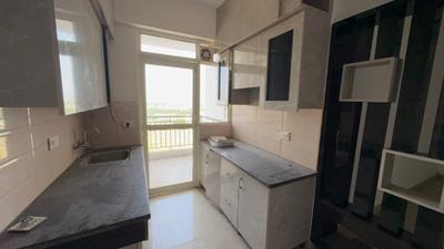 Kitchen Image of 950 Sq.ft 2 BHK Apartment / Flat for rent in Suncity Avenue 76, Sector 76 Gurgaon for Rs. 22000