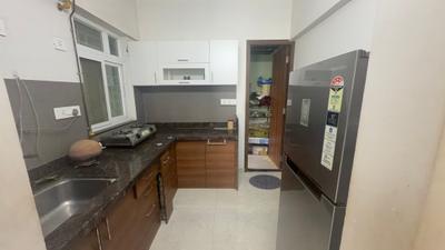 Kitchen Image of 900 Sq.ft 2 BHK Apartment / Flat for rent in Chandrarang Basileo, Pimple Gurav Pune for Rs. 37000
