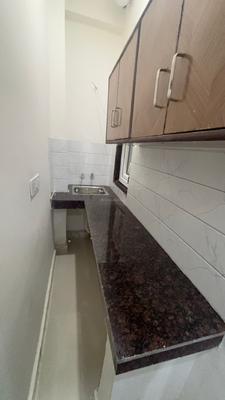 Kitchen Image of 250 Sq.ft 1 RK Apartment / Flat for rent in DLF Phase 3 Gurgaon for Rs. 15000