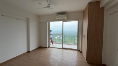 Bedroom Image of 1050 Sq.ft 2 BHK Apartment / Flat for rent in Godrej Woods, Sector 43 Noida for Rs. 52000