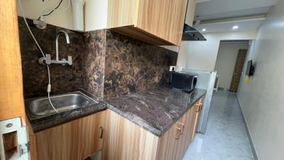 Kitchen Image of 1000 Sq.ft 1 BHK Builder Floor for rent in Sector 27 Gurgaon for Rs. 35000