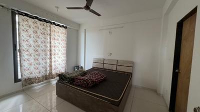 Bedroom Image of 1250 Sq.ft 2 BHK Apartment / Flat for rent in Shiv Shakti Uma Greens, Kudasan Gandhinagar for Rs. 23000